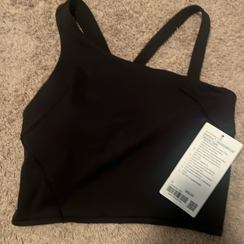Lululemon asymmetrical tennis tank size 6